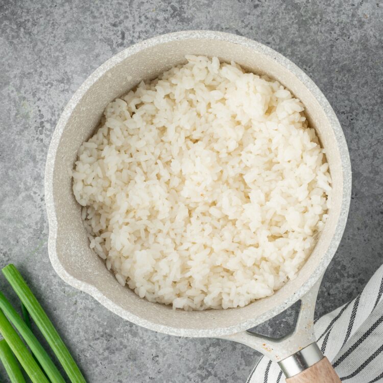 Fluffy white rice in a small pot.