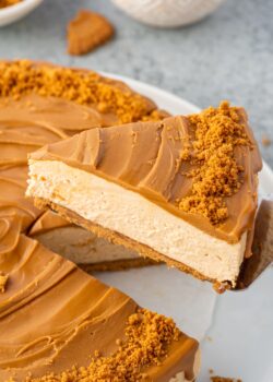 Serving a slice of Biscoff cheesecake.