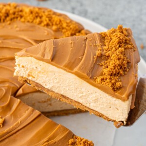 Serving a slice of Biscoff cheesecake.