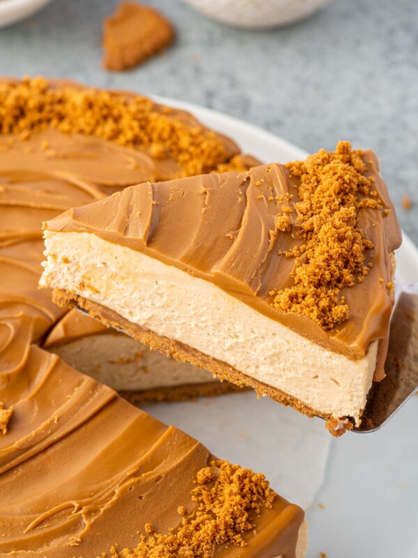 Serving a slice of Biscoff cheesecake.