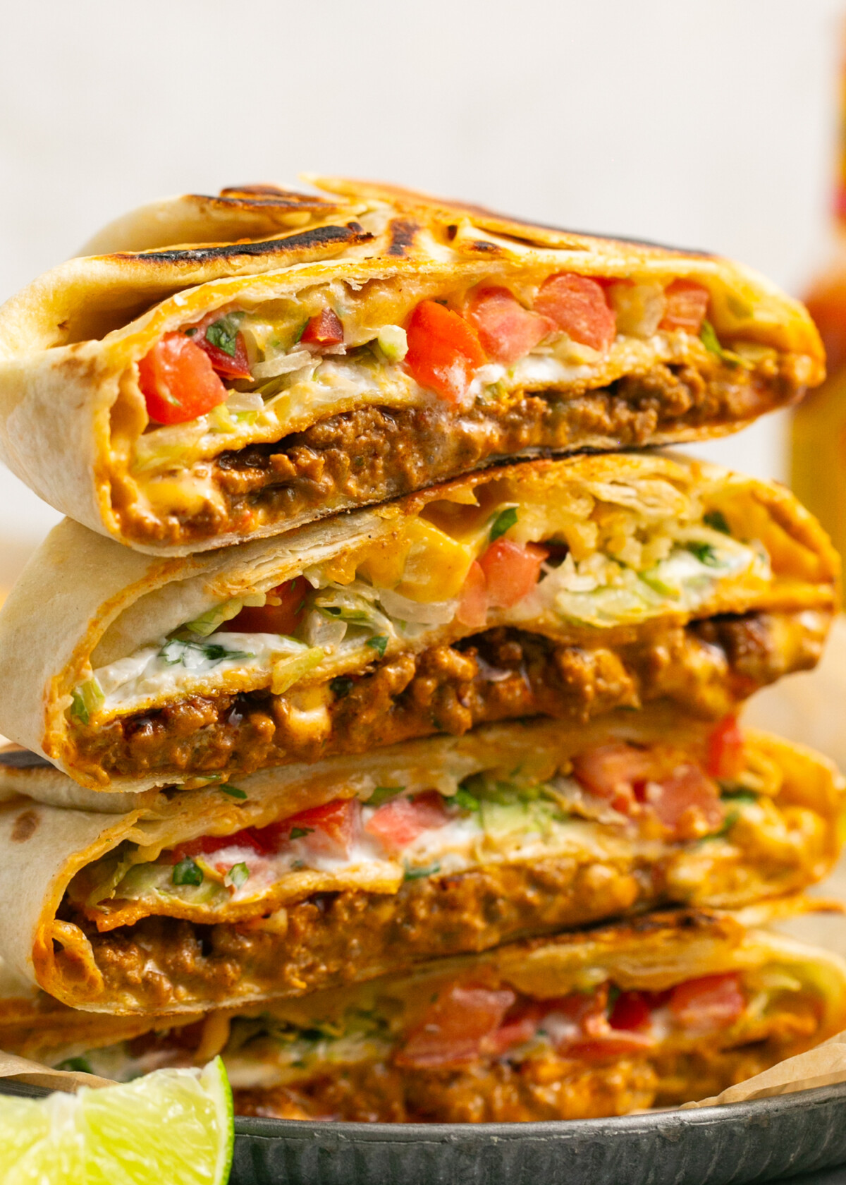 close up of stacked beef crunchwrap supremes